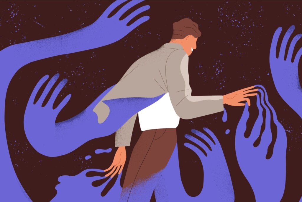 Ilustração de um homem cercado pela sombra de mãos em um fundo marrom